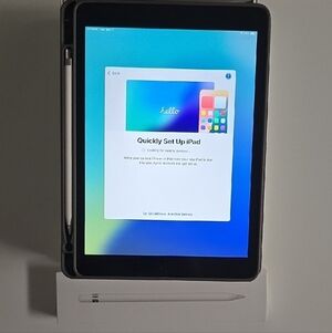 7th Gen Apple iPad with Black and White Stylus